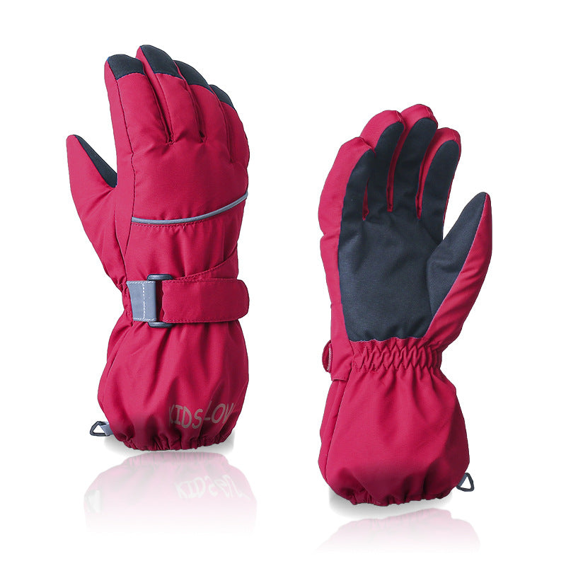Paire de gants enfant coloris rouge, vue de face et de la paume