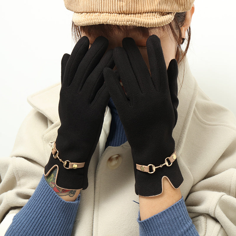 Gants femme noirs à bride contrastée et mors métal doré au poignet