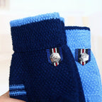 Gants enfant, détail du badge décoratif