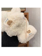 Moufle femme peluche teddy, détail du cordon tressé