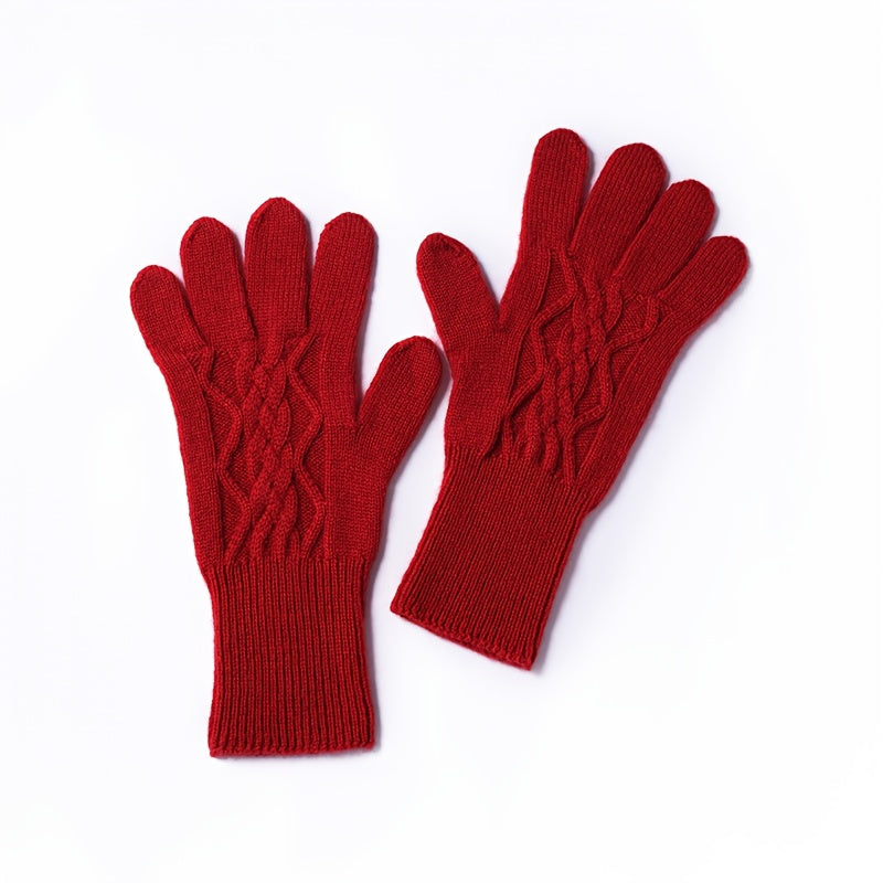 Paire de gants cachemire femme rouges, motif torsadé, posée à plat