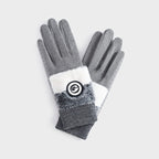 Gants de golf gris, bordure en fausse fourrure, vue à plat