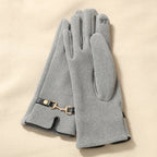 Gants femme gris à bride contrastée et mors métal doré au poignet