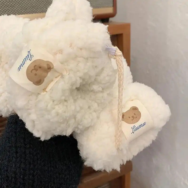 Moufle femme ourson, détail du cordon reliant les deux moufles