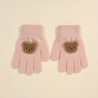 Gants enfant coloris rose, tricot extensible