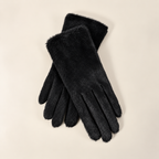 Paire de gants femme en peluche noire posée à plat