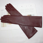 Gants cuir femme longs, coloris vin rouge, posés à plat