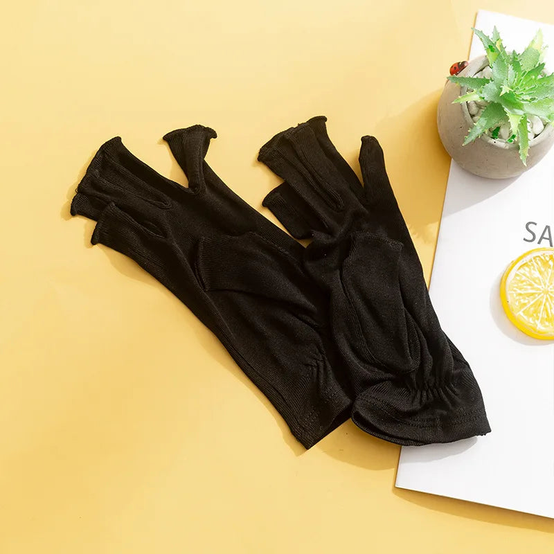 Gants femme en soie tricotée mi-doigts, coloris noir