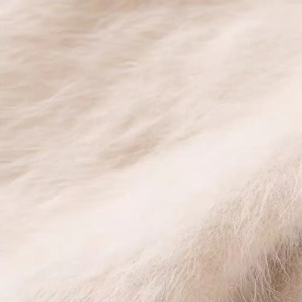 Gant femme en fourrure véritable, détail de la boucle