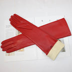 Gants cuir femme longs, coloris rouge, posés à plat