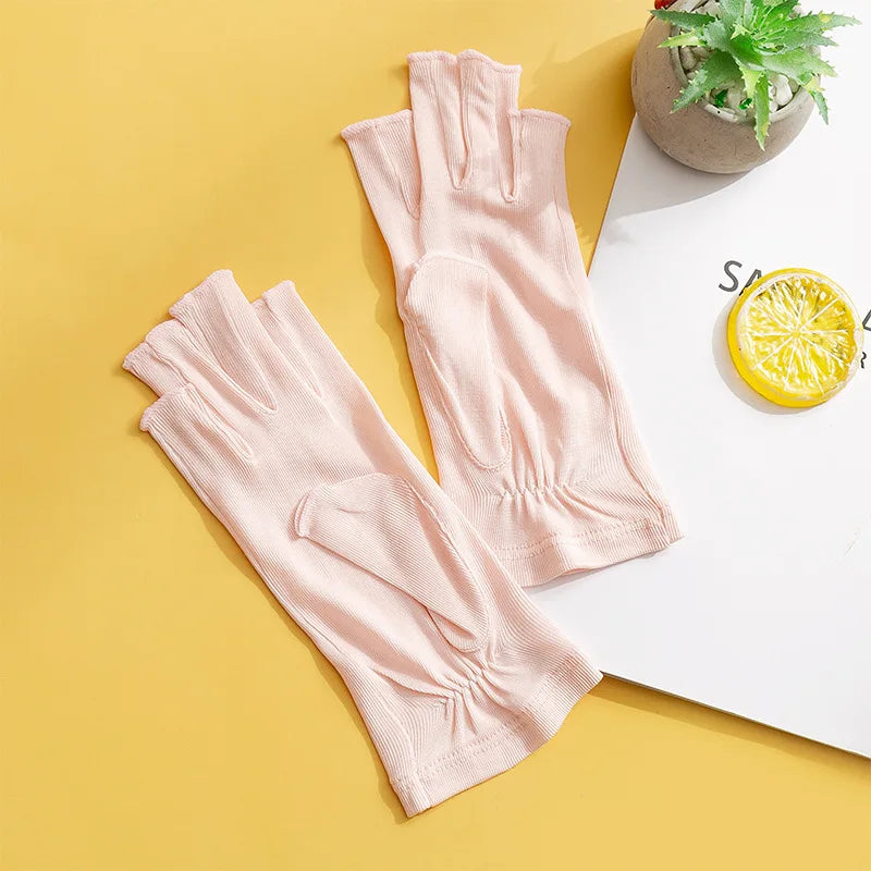 Gants femme en soie tricotée mi-doigts, coloris rose