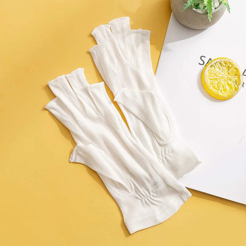 Gants femme en soie tricotée mi-doigts, coloris blanc