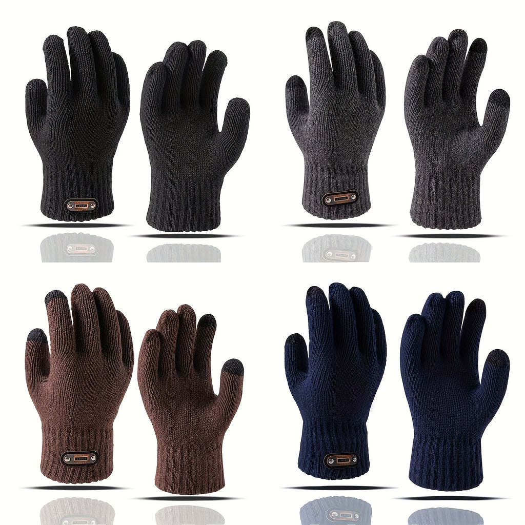 Gants homme noir portés, tenant un smartphone