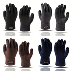 Gants homme noir portés, tenant un smartphone