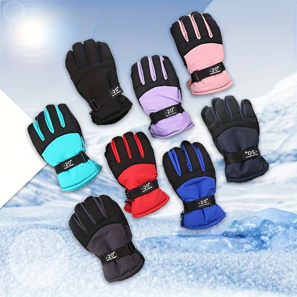 Gants de ski enfant, huit coloris disposés sur la neige
