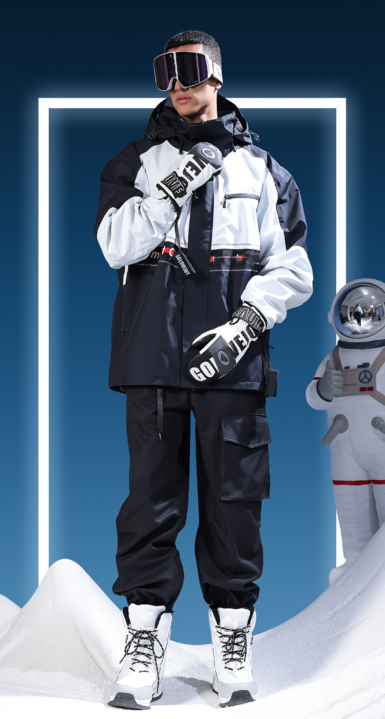 Homme en tenue de ski portant des gants moufle noir et blanc