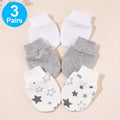 Moufles bébé motif étoile, coloris blanc et gris