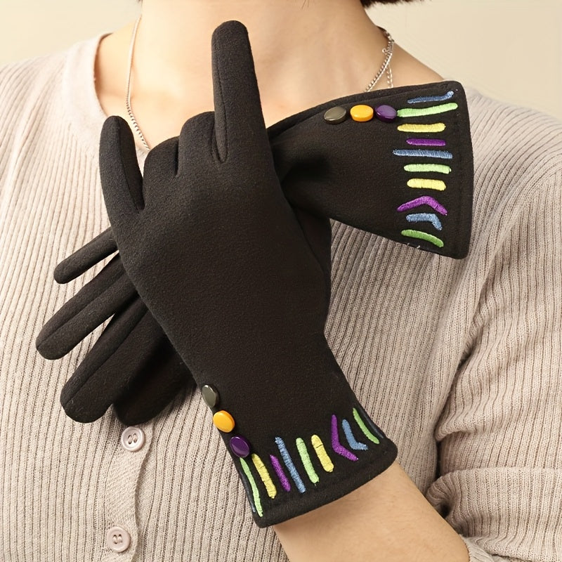 Gants femme noirs portés, broderie multicolore et boutons au poignet